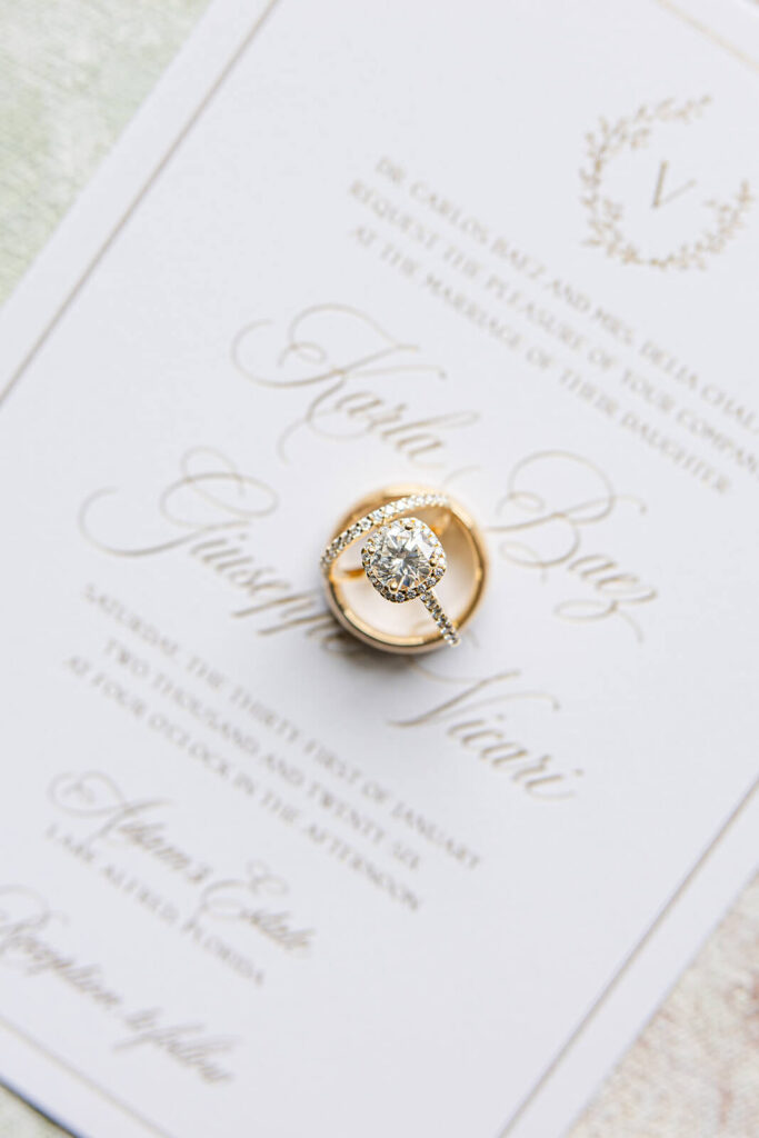 Formal wedding invitation card with bride's and groom's rings