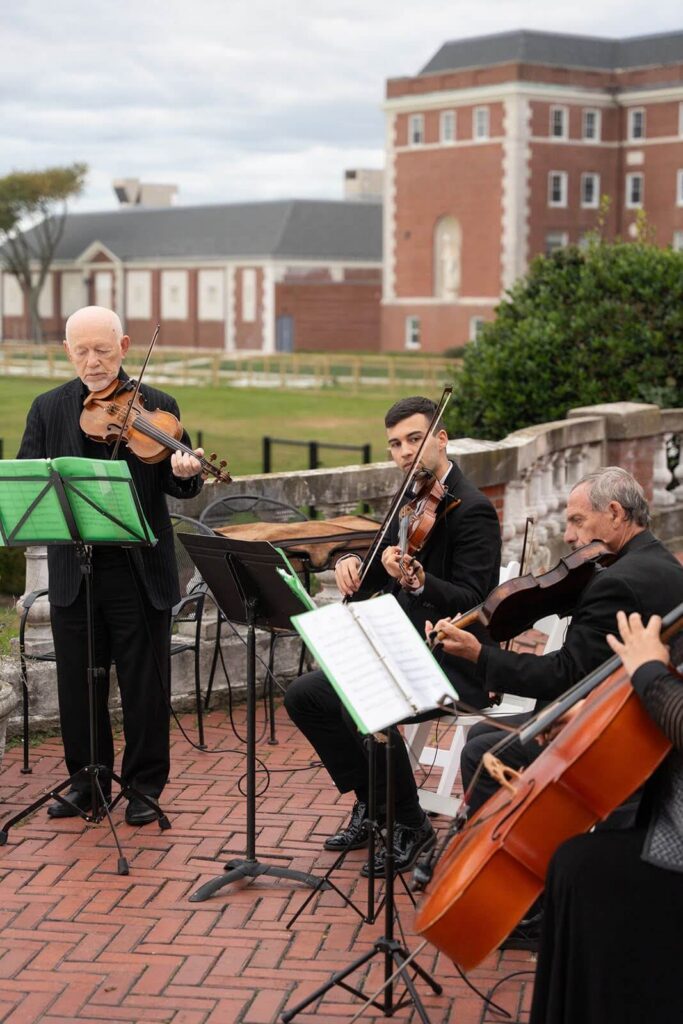 String quartet playing as bride walks down the aisle