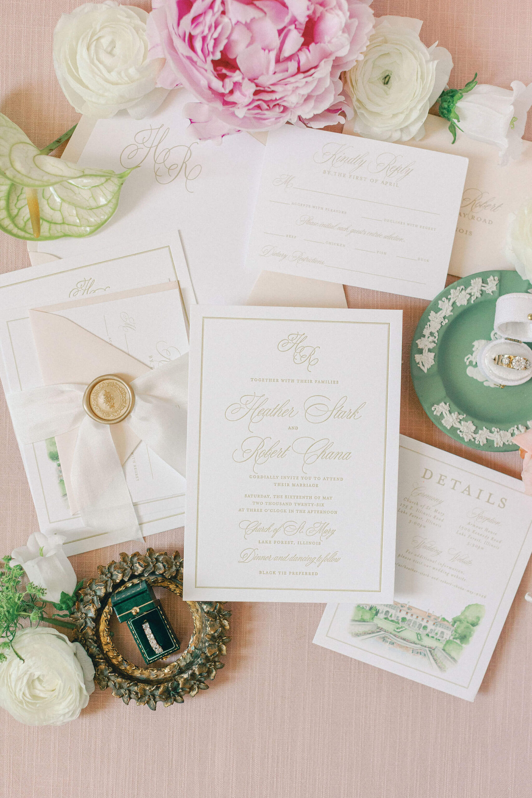 White and gold letterpress wedding invitation suite with a gold wax seal and light pink envelopes