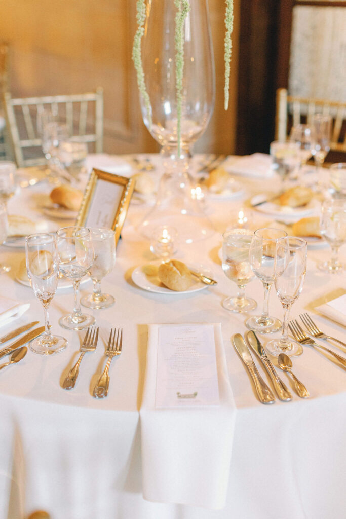 Wedding reception table featuring custom menu cards