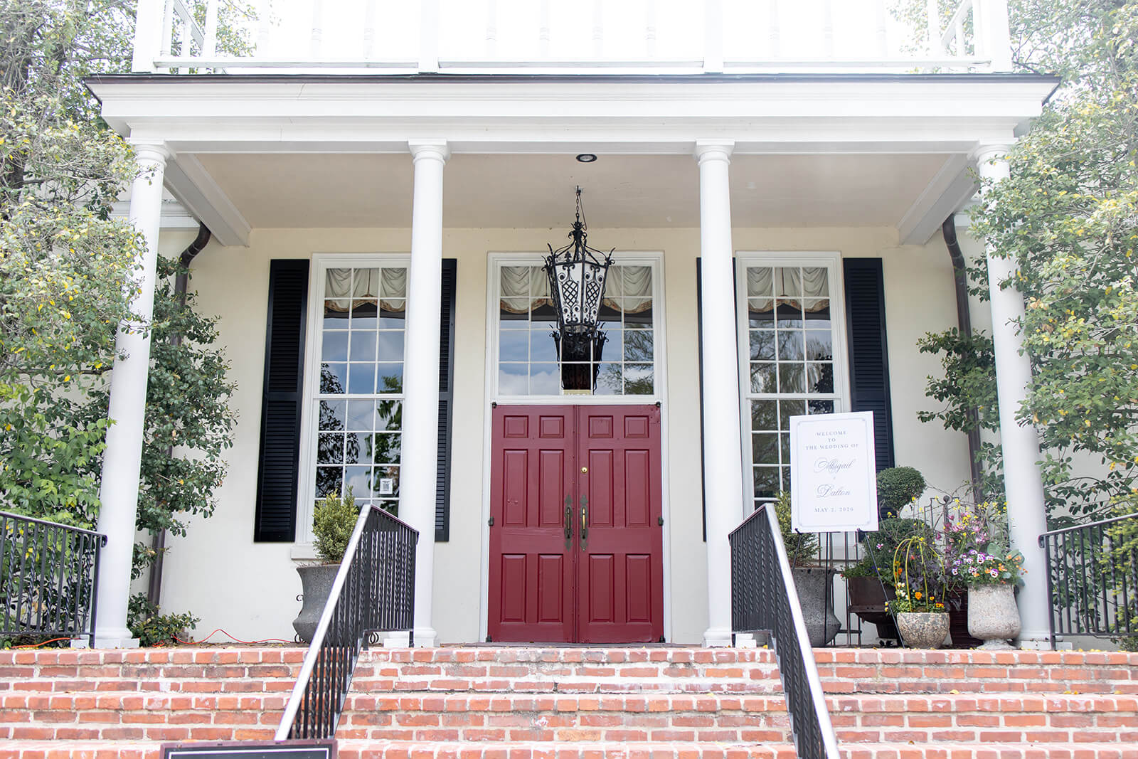 The entrance of the Kimberton Inn with a welcome sign for Abby and Dalton's wedding