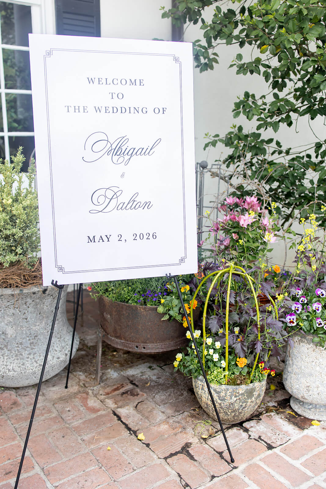 Traditional wedding reception welcome sign for a spring wedding at the Kimberton Inn