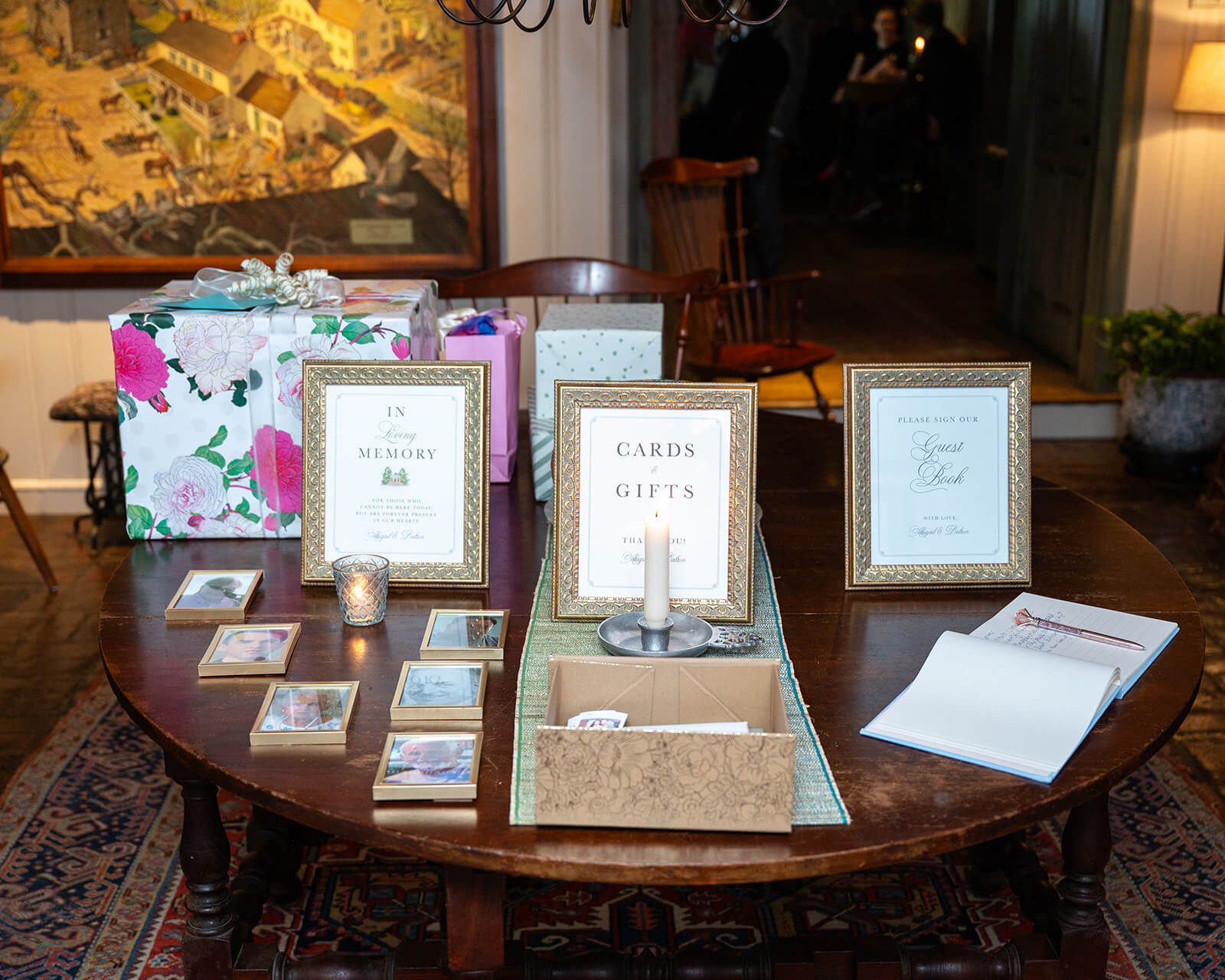 Traditional wedding signs on a table instructing guests to leave cards & gifts, sign a guestbook, and remember loved ones