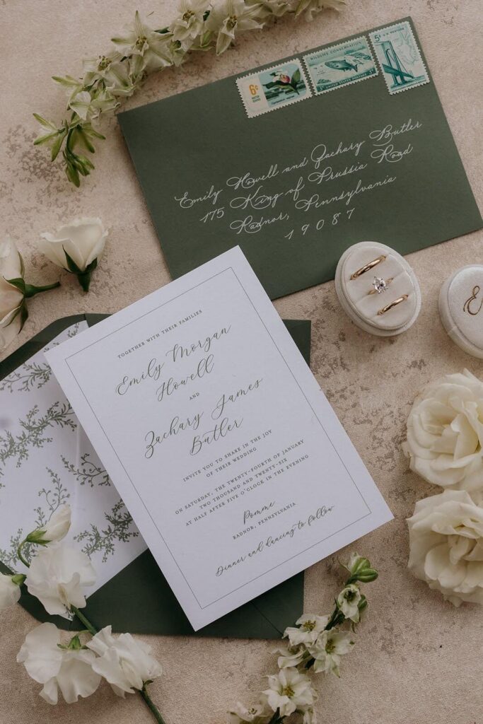 Nature-inspired wedding invitation keepsake suite flat lay