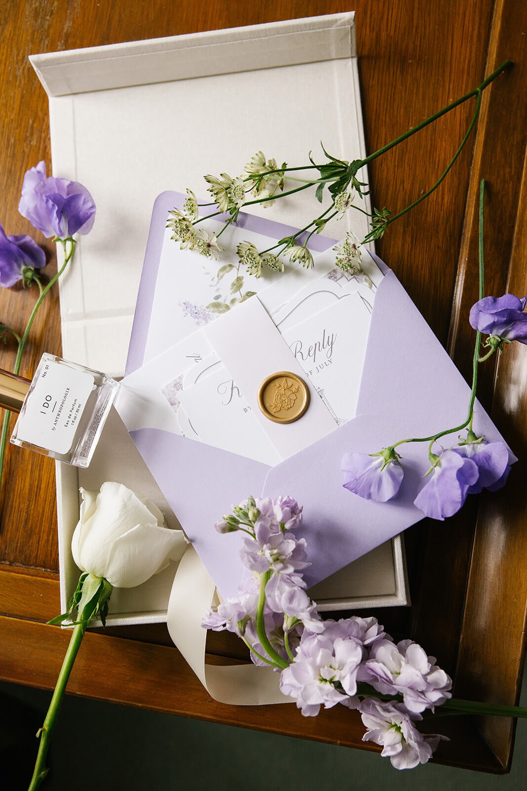 Light purple wedding invitation keepsake suite in a linen box