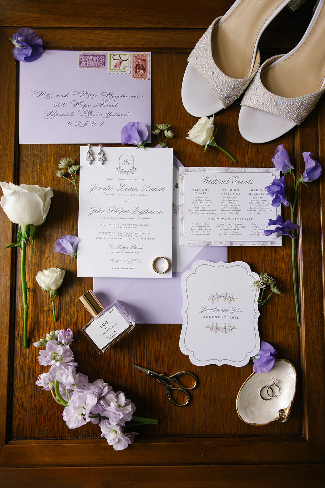 Romantic and elegant purple wedding invitation suite with floral details