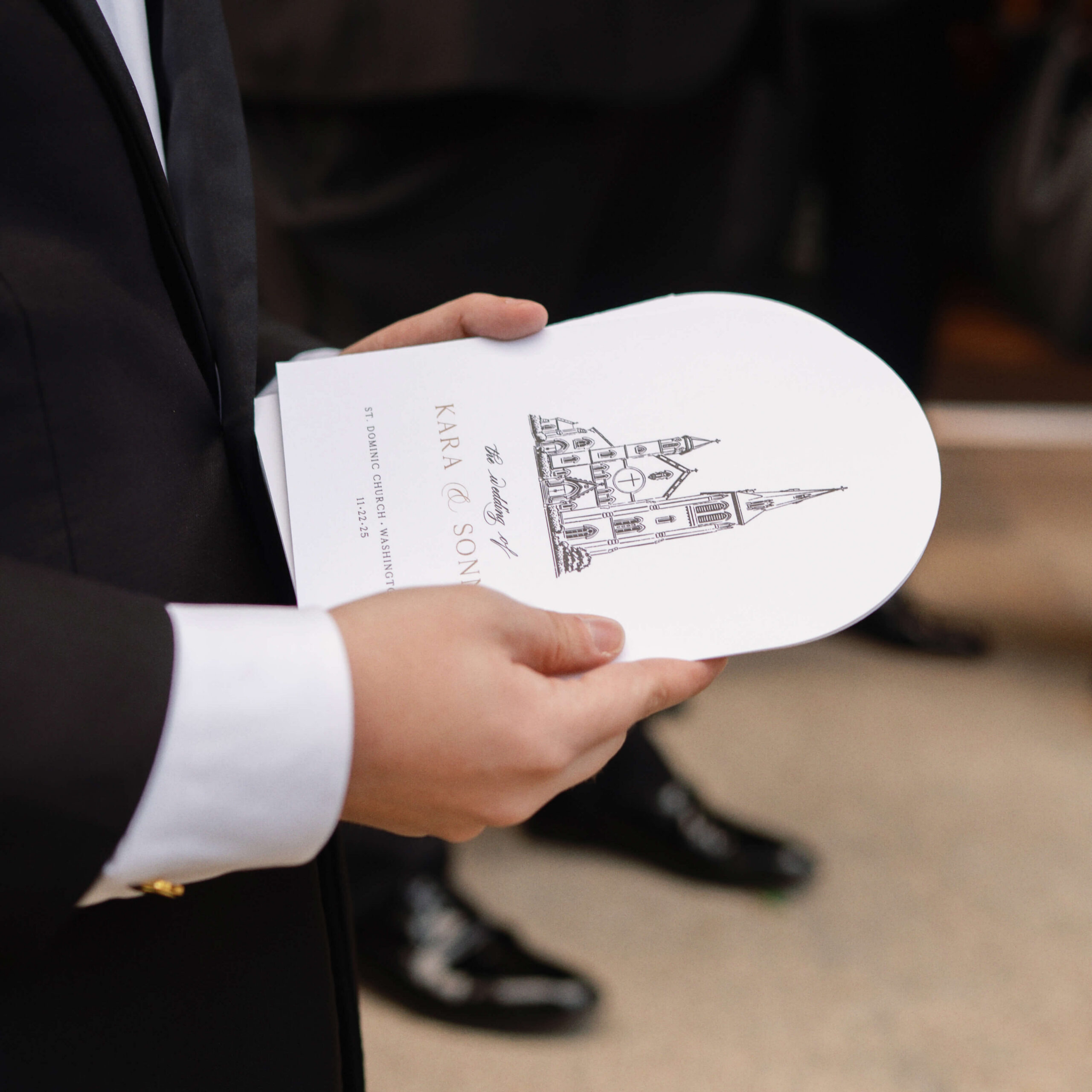 Arched wedding ceremony program with a line art venue illustration